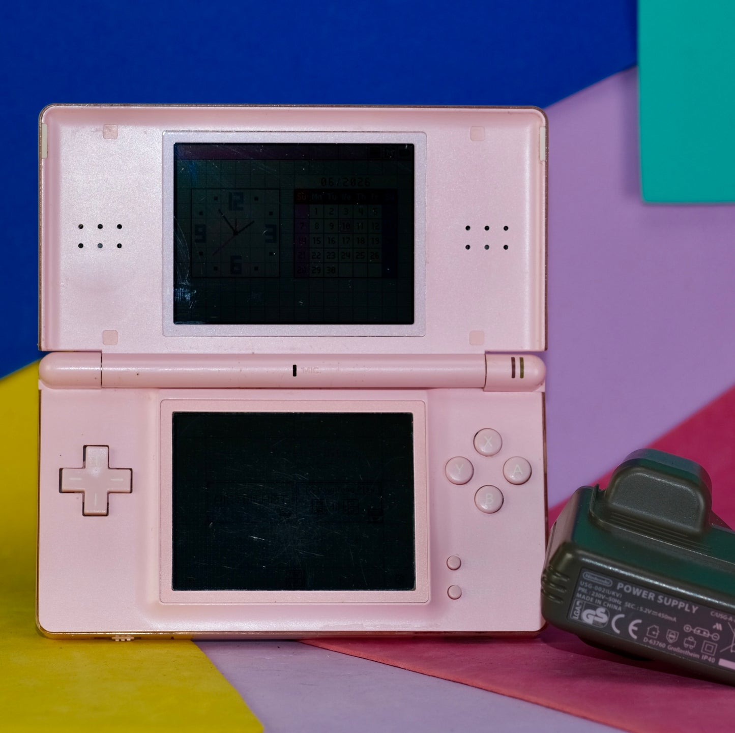 Nintendo DS lite, pink, with original charger