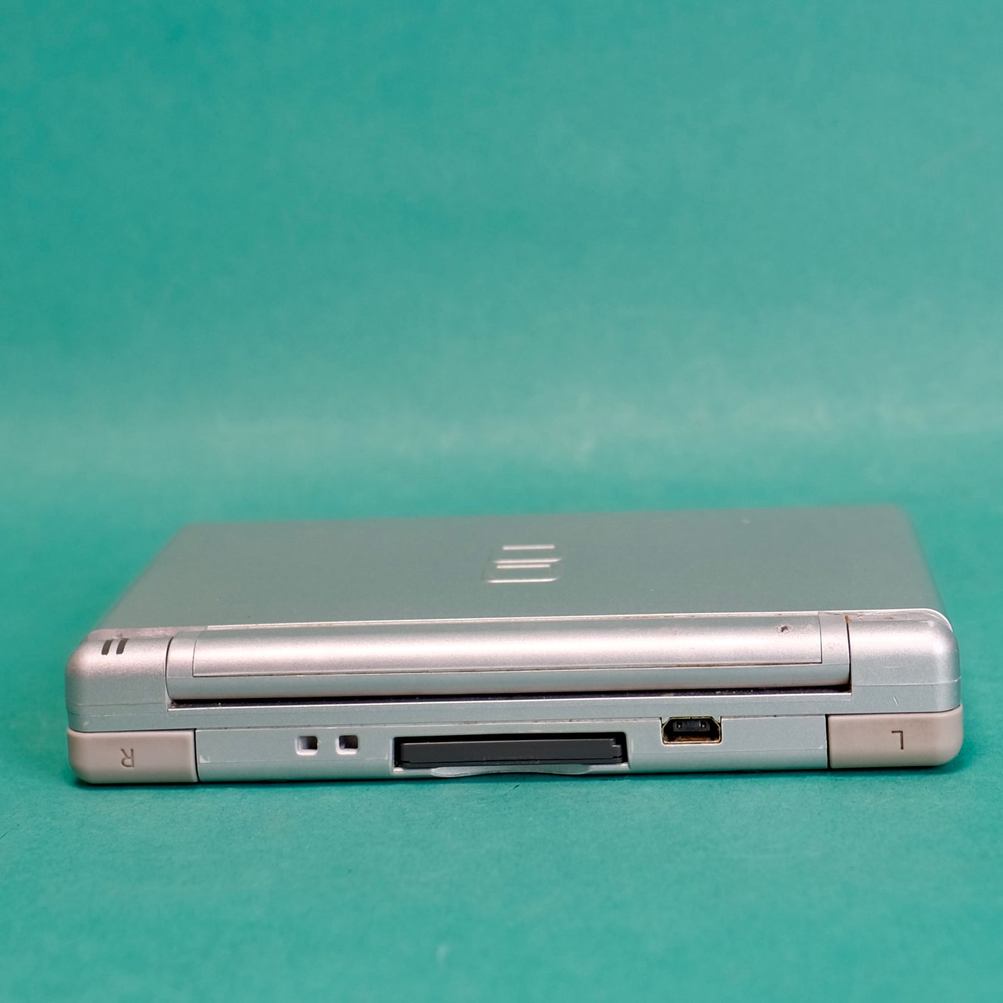 Nintendo DS lite, silver, with original charger defect