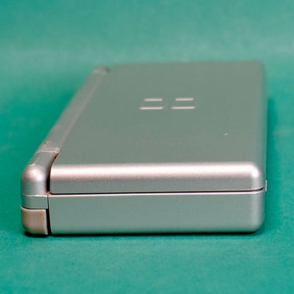 Nintendo DS lite, silver, with original charger defect