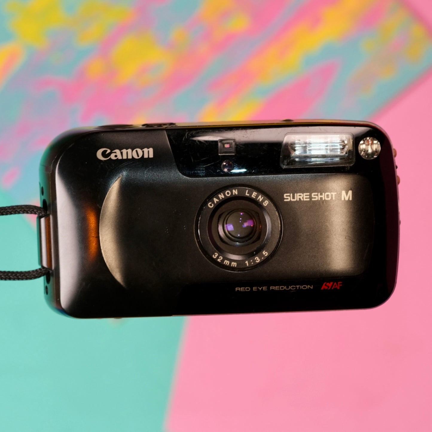 Canon sure shot M 35mm point and shoot film camera