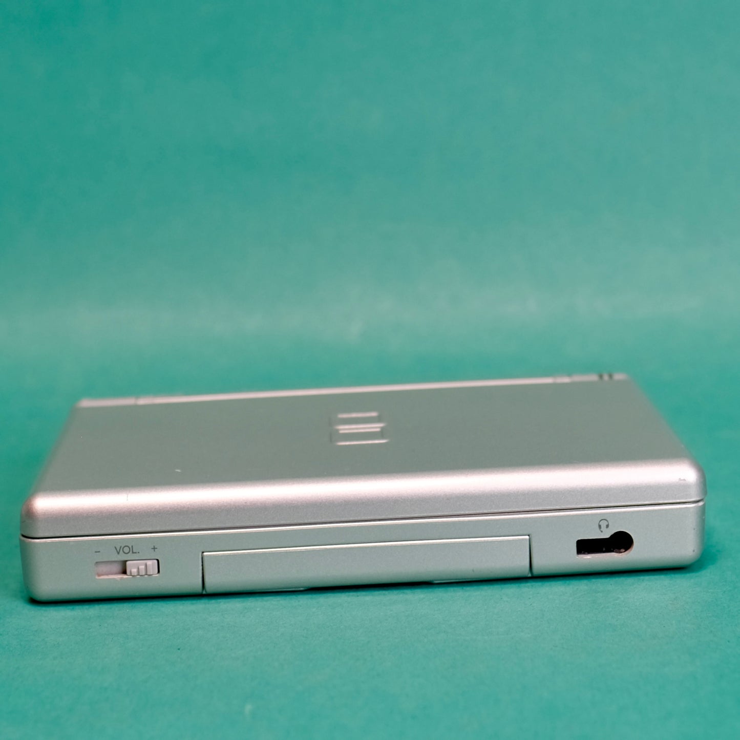 Nintendo DS lite, silver, with original charger defect