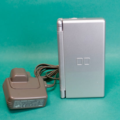 Nintendo DS lite, silver, with original charger defect