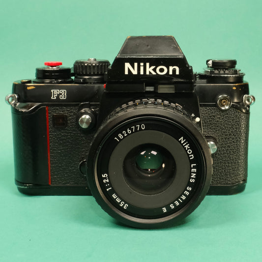 Serviced nikon F3 SLR film camera and 35mm f2.5 lens k focusing screen