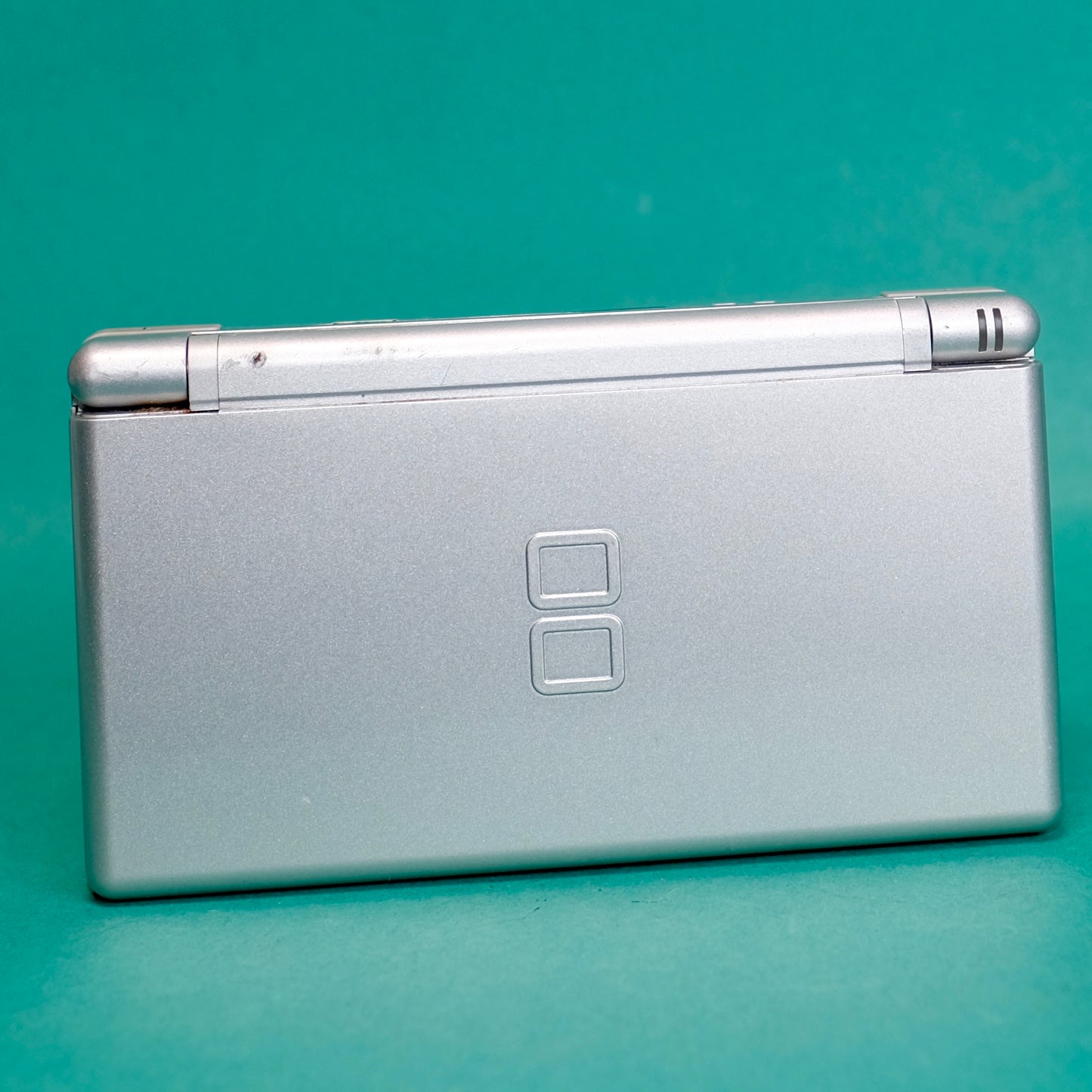 Nintendo DS lite, silver, with original charger defect