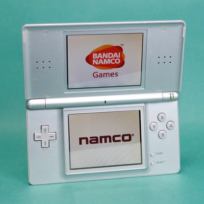 Nintendo DS lite, silver, with original charger defect